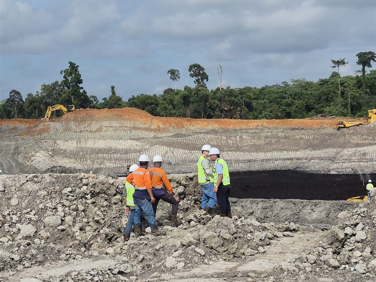 Geologists inspecting the pit