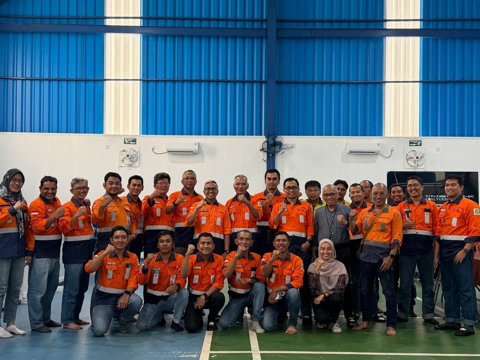 Team gathered in the workshop