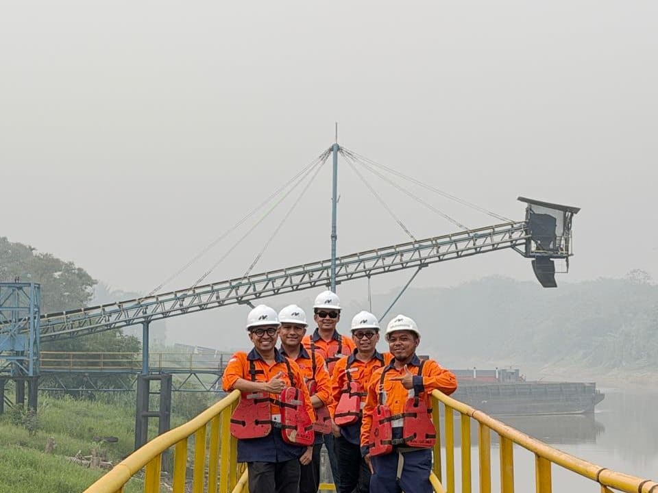 Team on the jetty walkway
