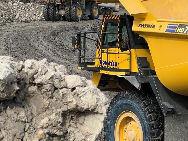 Haul trucks working the pit
